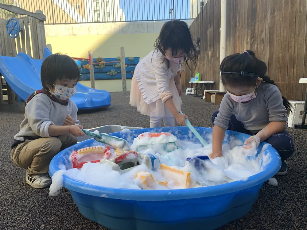Preschoolers Playing with Bubbles Preschoolers Playing with Bubbles