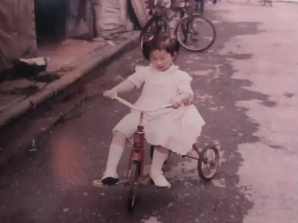 Young Wei Qian learning to ride