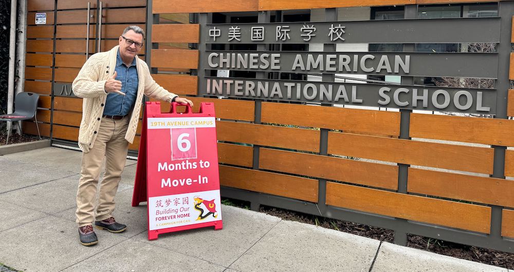 Head of School Jeff Bissell with Campus Countdown Sign Marking 6 Months to Start of School at 19th Avenue